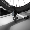 Thule Wheel Strap Locks Fitted To Thule's ProRide Roof Mounted Cycle Carrier
